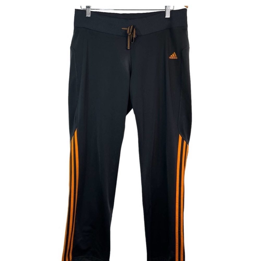 Adidas Women’s Black and Orange Track Pants size Medium